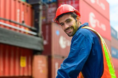 Warehouse engineer worker working at container yard. Logistics and transportation. High quality photo