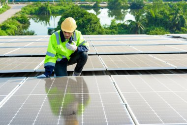 Professional engineer technician with safety helmet checking system. High quality photo