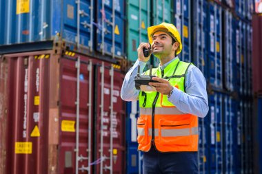 Warehouse engineer worker working at container yard. Logistics and transportation. High quality photo