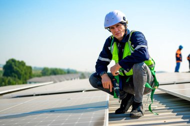 Professional engineer technician with safety helmet checking system. High quality photo