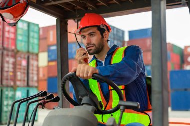 Warehouse engineer worker working at container yard. Logistics and transportation. High quality photo