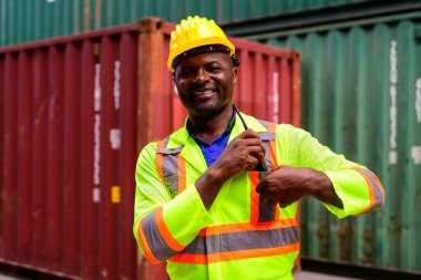 Warehouse engineer worker working at container yard. Logistics and transportation. High quality photo