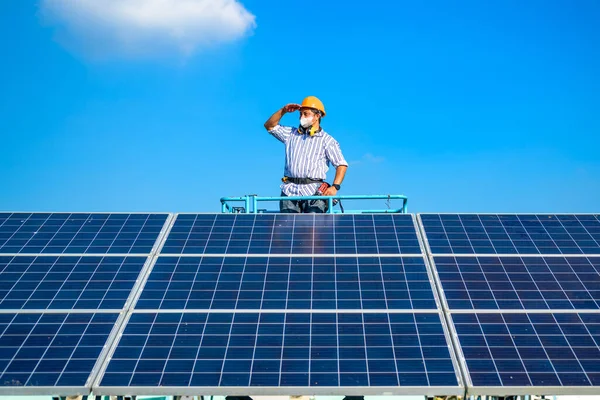 stock image Solar panel station, Engineer worker installing solar panel at solar energy farm field, Alternative energy