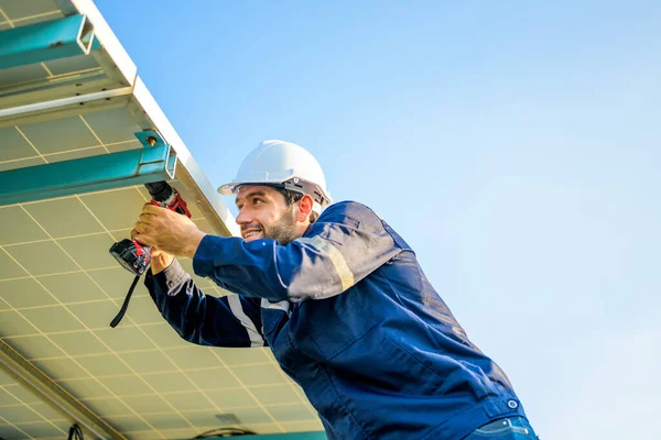 stock image Solar panel station, Engineer worker installing solar panel at solar energy farm field, Alternative energy