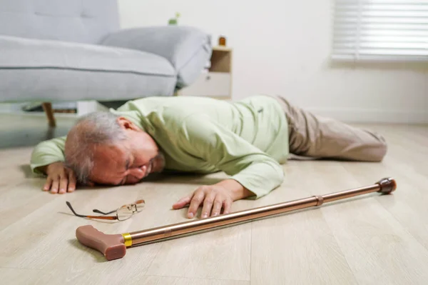 stock image Senior slip and fall, Elderly people accident slip and fall, Unconscious people on ground, Accident in home, Accident of senior slip and fall to floor