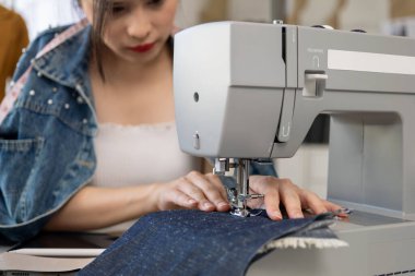 Female designer business owner, Tailoring business owner, Clothing store owner, Design fashion clothes by designer