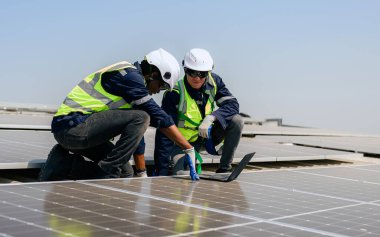 Professional engineer technician with safety helmet checking system. High quality photo