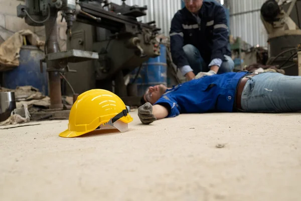 Engineer worker with accident at factory, Worker with injury from machine working
