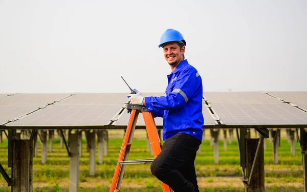 Maintenance engineer team checking and installing solar panels on solar cell farm, Technician working on ecological solar farm, People with clean energy technology, Renewable energy, Solar power plant