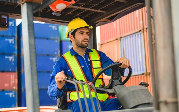 stock image Industrial warehouse foreman using walkie-talkie working at overseas shipping container yard, Logistics supply chain management, International good import and export, Logistics service and