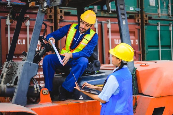 Industrial engineer worker with co-worker team working at overseas shipping container yard, Logistics supply chain management, International good import and export