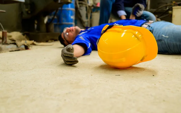 stock image Male engineer worker with accident at factory, People with injury from hard work in factory, Worker with injury from machine working