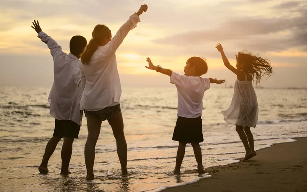 stock image Happy family father mother daughter and son spending vacation time together on beach, Family with beach travel, Happy Asian family travel together on beach on holiday, Family with beach travel, People