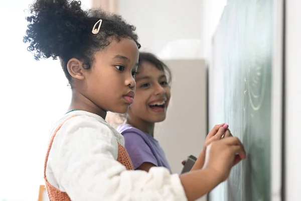 Happy Girls Pupils Writing Blackboard Classroom Elemschool Students Doing Test — Stock Fotó