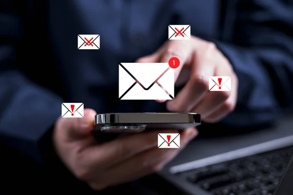 Businesswoman using smartphone in office with new e-mail alert sign icon, New e-mail notification for business e-mail communication, Inbox receiving electronic message alert. People receiving new