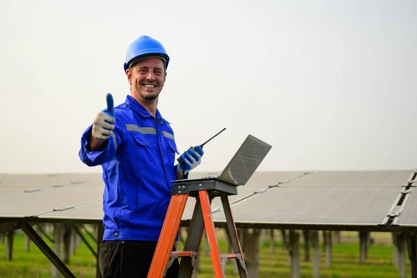 Engineer technician checking and maintaining solar panels on solar power plant, Technician working on ecological solar farm, People with clean energy technology, Renewable energy, Solar power plant