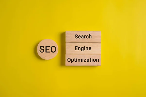 SEO text on wooden cube, Search engine optimization ranking, SEO website ranking, Keywords ranking, Traffic and data analysis, Ranking traffic and website promoting tools, Business and marketing