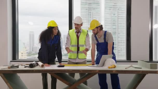 Professional Construction Engineers Team Using Blueprint Project Plan Brainstorming Working — Video