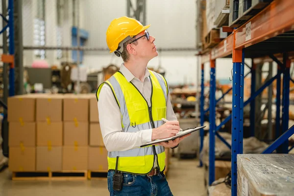 Professional Warehouse Workers Safety Vest Talking Together Checking Goods Storage — Stock Photo, Image