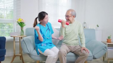 Senior people doing physical therapy after surgery operation, Elderly adult exercising by lifting weights at home, Senior patient at living room, Medical treatment concept