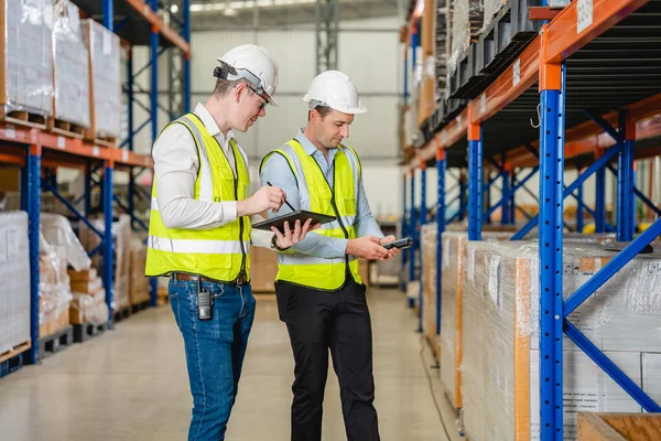 Professional Warehouse Workers Safety Vest Talking Together Checking Goods Storage — Stock Photo, Image