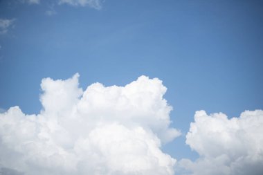 Blue sky background with clouds. High quality photo