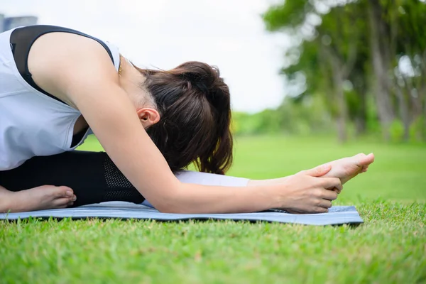 stock image life style of young woman practice yoga at park. out door Yoga at park. High quality photo
