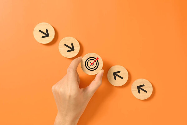 Goal and arrow up icon on wooden blocks, Business growth success process, Business achievement goal and target, Planning and development for corporation. High quality photo