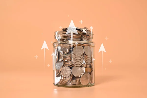 Jar of coins with virtual arrow up on background, Interest rate increases, Profit from deposit money, Successful business investment, Money savings for future, Interest rate and mortgage rates. High