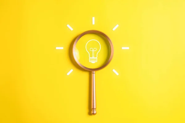 Stock image Light bulb icon with magnifying glass for creative idea thinking, Business strategy planning management, Business development, Survey and quality control assessment to achieve business goal. High