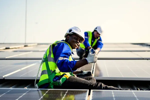 Maintenance technicians workers installing solar panels at solar cell farm, Engineers working at power station, Electric system maintenance at solar panels field, Eco friendly and clean energy