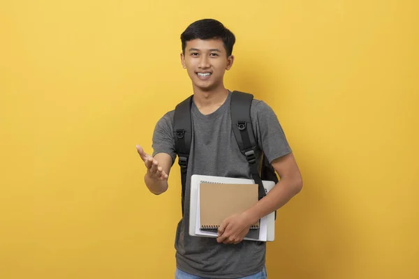 Smiling Young College Student Books Backpack Isolated Yellow Background Friendly — Stok Foto