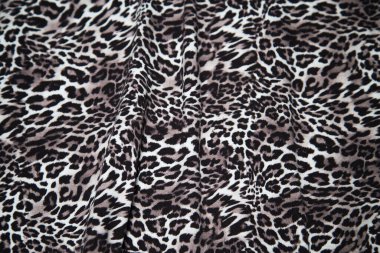 Leopard effect, fabric pattern. Background sample, seamless background print texture. Animal textile design.