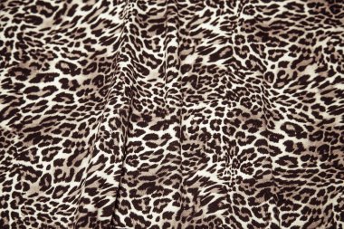 Leopard effect, fabric pattern. Background sample, seamless background print texture. Animal textile design.