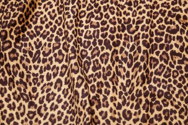 Leopard effect, fabric pattern. Background sample, seamless background print texture. Animal textile design.