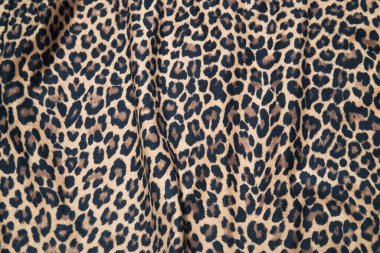 Leopard effect, fabric pattern. Background sample, seamless background print texture. Animal textile design.