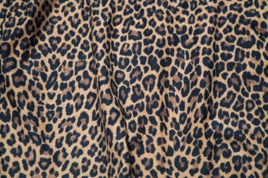 Leopard effect, fabric pattern. Background sample, seamless background print texture. Animal textile design.