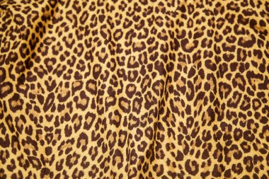 Leopard effect, fabric pattern. Background sample, seamless background print texture. Animal textile design.