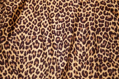 Leopard effect, fabric pattern. Background sample, seamless background print texture. Animal textile design.