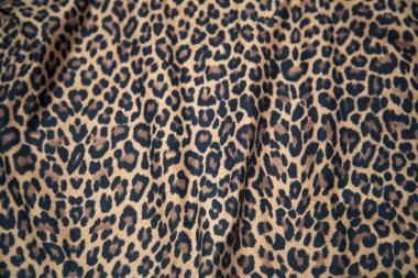 Leopard effect, fabric pattern. Background sample, seamless background print texture. Animal textile design.