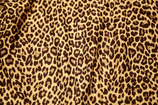 Leopard effect, fabric pattern. Background sample, seamless background print texture. Animal textile design.
