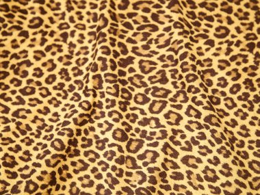 Leopar arkaplan dokusu safari desenli leopar desenli kumaş kumaş tasarımı.