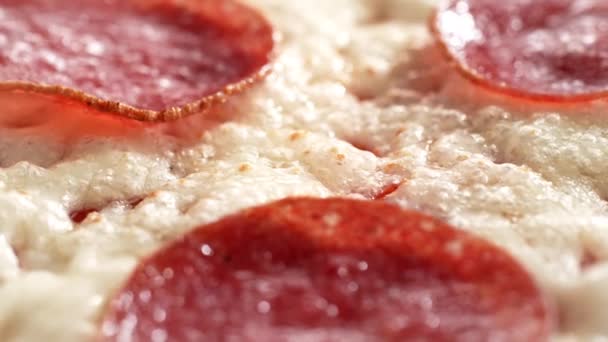 Melting Cheese Browning Salami Sausage Top Rotating Pepperoni Pizza Macro — Stok Video