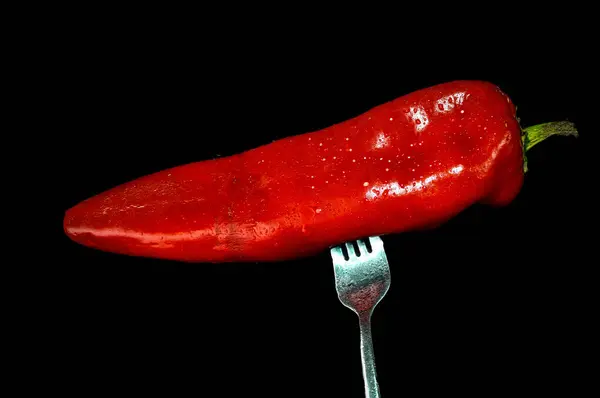 Pierce, çatalla kırmızı biberli. Yüksek kalite fotoğraf