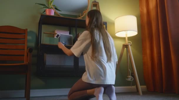Young Woman Turns Air Conditioner Heating Mode Efficient Room Warming — Stockvideo