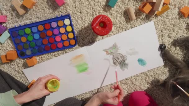 Top View Mothers Daughters Hands Painting Together Family Pet Portrait — 图库视频影像