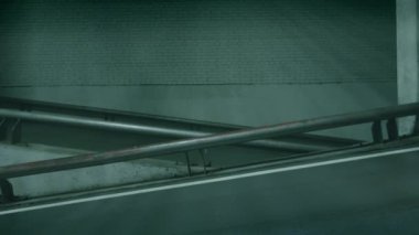Side view of a car moving up at underground parking, industrial background, front and back lights, black elegant auto, dark scene. High quality 4k footage