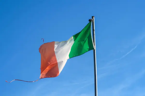 Italian Italy flag hanging waving wind blue sky tricolor green white red art history tourism culture