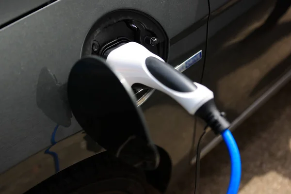 E-Mobility, Charging an electric car.