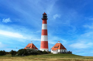 Almanya 'nın kuzeyinde Schleswig-Holstein eyâletinde Westerhever Deniz Feneri.